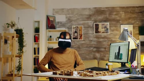 Man Works in VR on Architecture Project