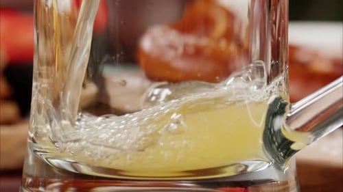 Pouring Beer in Glasses Closeup