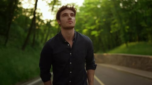 Smiling Male Person Having Walk Outside. Cute Man Resting Outdoors