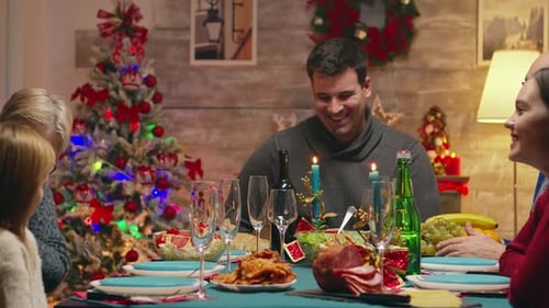 Family Enjoys Christmas Dinner at Home