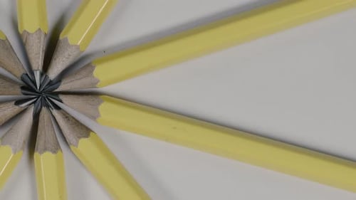 Yellow Pencils Arranged in a Radial Pattern