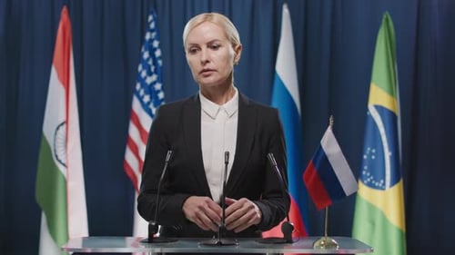 Businesswoman Giving Speech at Press Conference