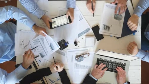 Top View Male and Female Hands of Business People Planning Strategy for Corporate Project in Office