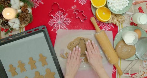 Woman Cuts Gingerbread Cookies for Christmas, Celebration, Making Gingerbread Cookies