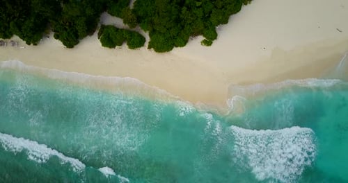 Tropical aerial abstract shot of a paradise sunny white sand beach and turquoise sea background in c