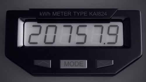 Digital electricity meter showing household consumption in kilowatt hours.