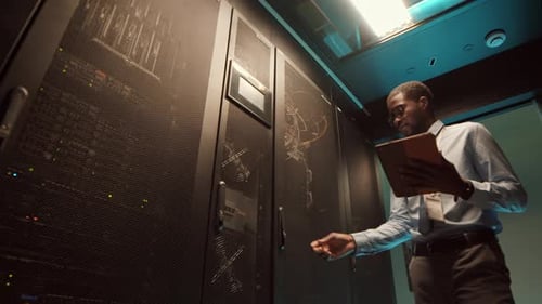 IT Technician Checking Data Center Work