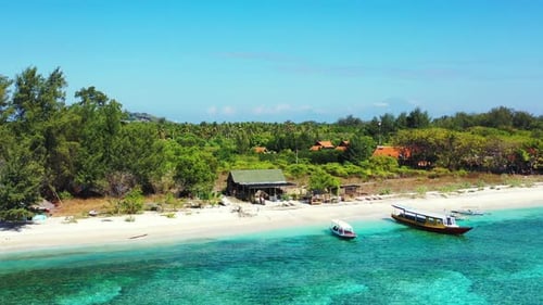 Tropical fly over clean view of a white paradise beach and blue water background