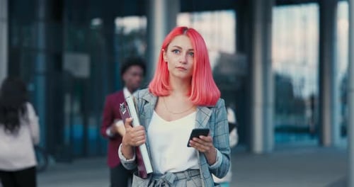 End of Work in Corporation Officeboss Secretary Business Woman Walks Out of Modern Building Holding
