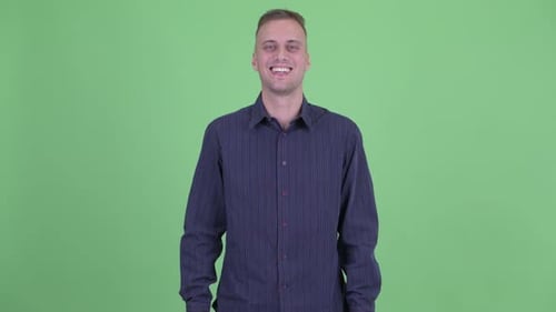 Smiling Man in Button Down Shirt