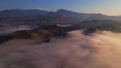 4K Aerial view of Mountains landscape with morning fog.