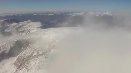 Beautiful Winter Aerial Flight Over Mountain