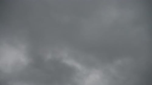 Dark Clouds Moving Slowly Across the Sky