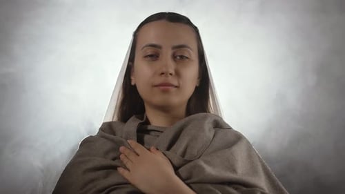 Woman with Shawl in Fog Gazing Forward