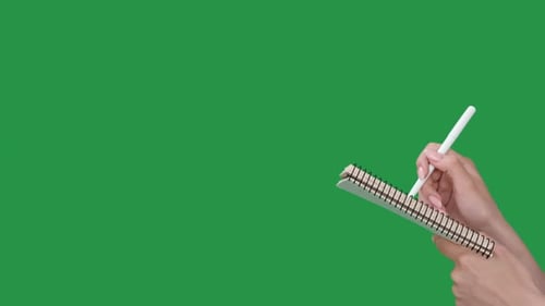 Hands Writing in Notebook on Green Screen