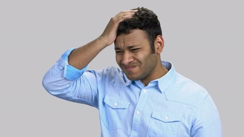 Young Adult Man Suffering from Headache