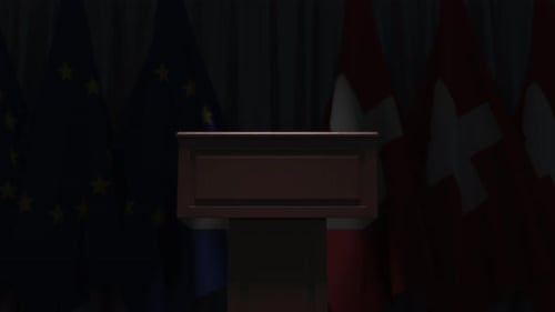 Podium with Waving European Union and Swiss Flags