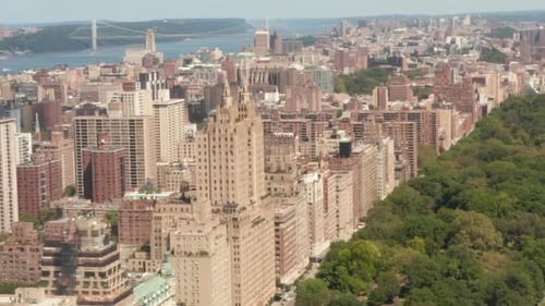 AERIAL: Beautiful New York City Buildings with Central Park at Sunny Summer Day