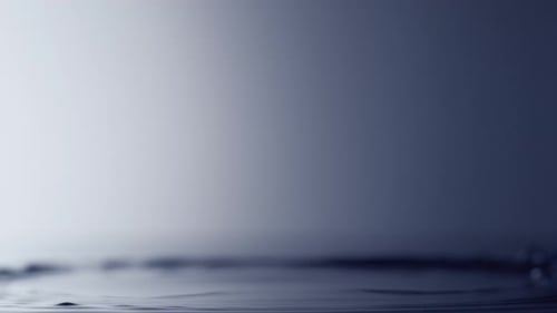 Water Droplets Splash in Slow Motion, Abstract Shot