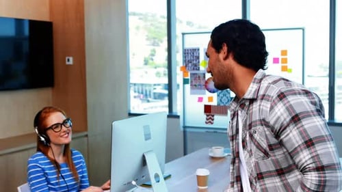 Colleagues Talking in Modern Office at Daytime