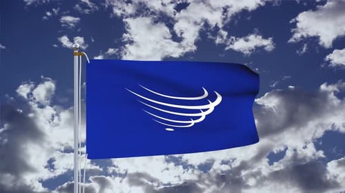 Waving Flag Animation with Custom Logo against Blue Sky