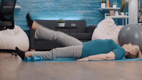 Senior Woman Exercising at Home