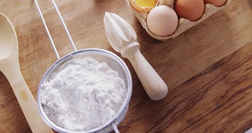 Baking Ingredients on Wooden Tabletop Close Up