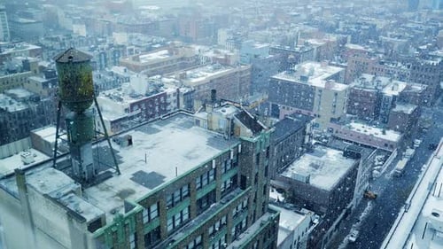 Snow Falling in the City during Cold Winter Weather Season