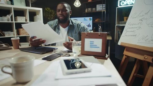 Portrait of Frustrated Male Professional Finding Mistake in Documents in Office.
