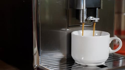 Espresso Machine Pours Coffee into Cup