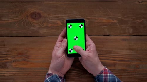 Hands Unrecognizable Person Typing in Smartphone with Green Screen