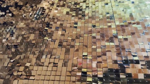 Shimmering Golden Sequins Creating a Glittering Abstract Texture