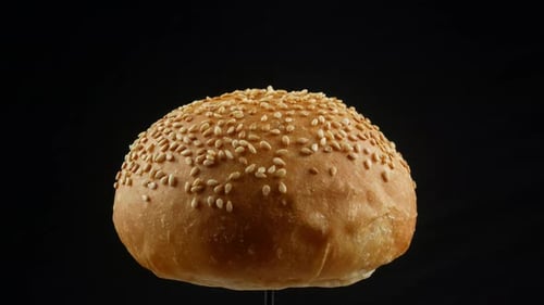 Rotating Hamburger Bun with Sesame Seeds on Top