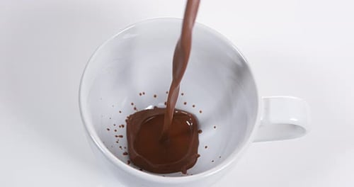 Chocolate Pouring into a Bowl, Slow Motion 4K