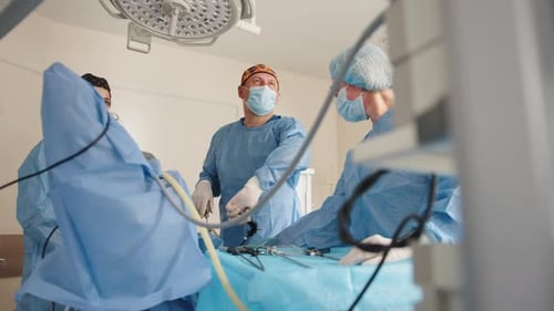 Medical Team Performing Surgical Operation in Hospital Operating