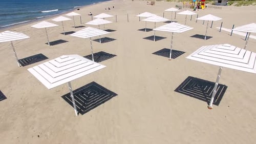 Aerial view of the beach umbrellas in summer