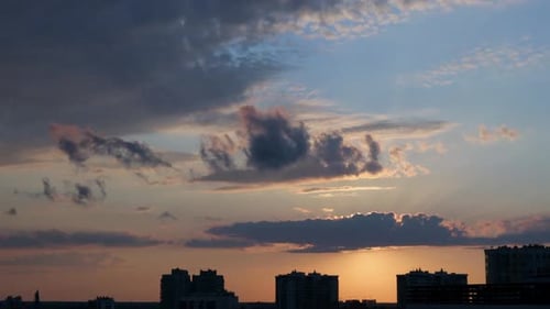 Golden Sunrise Time-Lapse Over City Buildings