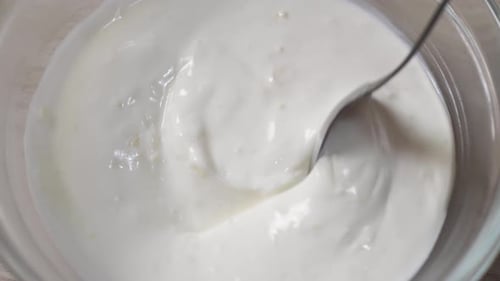 Close Up of Fresh Healthy Creamy Yogurt Sauce in a Bowl Ready for a Delicious Healthy Breakfast