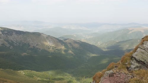 Slow tilt on highlands of Stara planina mountain 4K 2160p 30fps UltraHD footage - View from Midzo