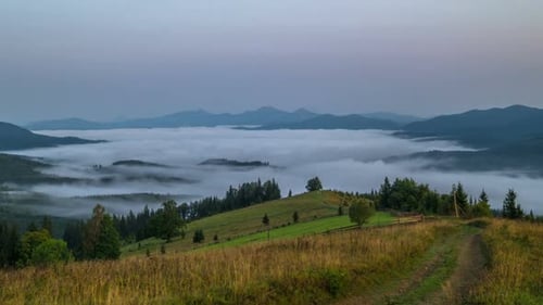 Misty Mountain Range in a Tranquil Landscape