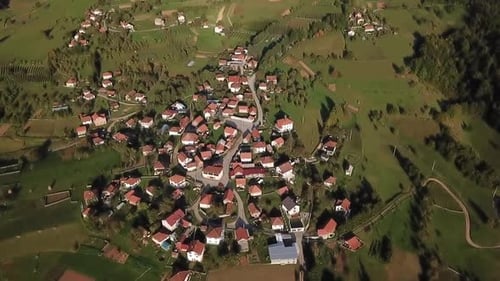 Aerial Shot Over Village In Mountains