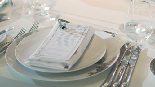 Elegant Wedding Table Setting with Fine Dining Menu
