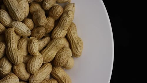 Pile of Peanuts in Shells on Plate