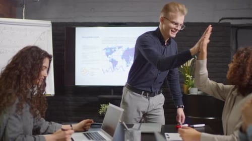 Coworkers Giving High Five