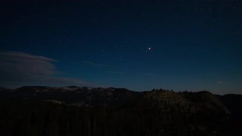 4K astrophotography star timelapse of a rocky mountain and forest vista, featuring Mars, in the Cali