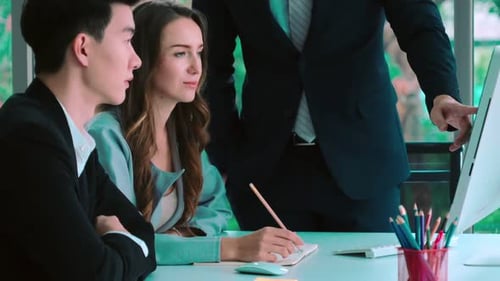 Smart Businessman and Businesswoman Talking Discussion in Group Meeting