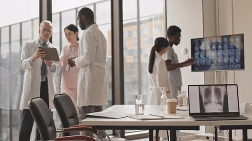 Medical Professionals Collaborating on Patient Diagnosis