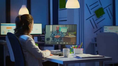 Businesswoman Having Corporate Meeting with Remotely Paralyzed Man