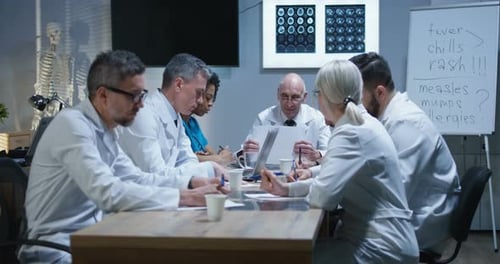 Medical Professionals Team Meeting in Hospital Office