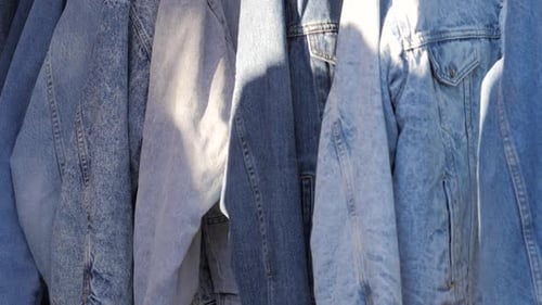 Rack of Blue Denim Jean Jackets outside